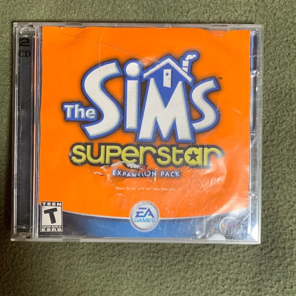 The Sims Superstar Expansion Pack. 2 CD’s. Rated Teen.